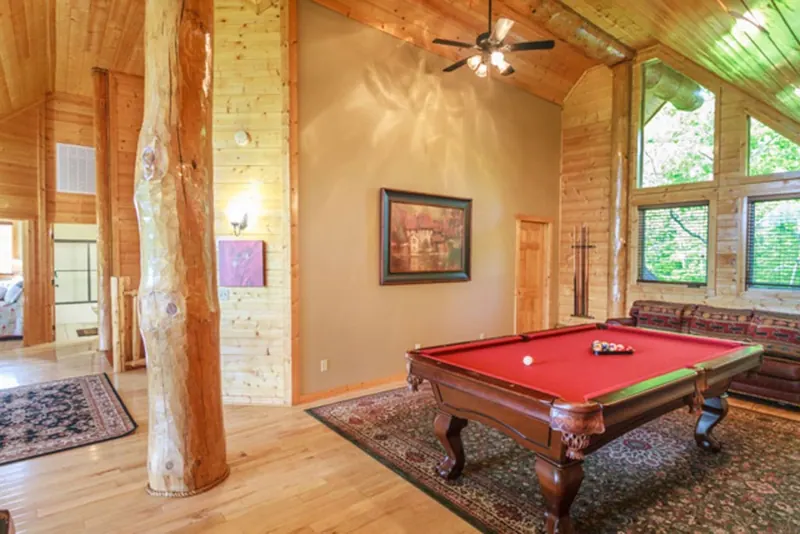 Pool table, TV, and sofas upstairs for entertainment and relaxing.