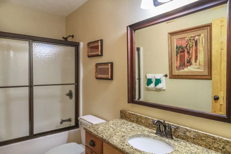 Upstairs full bathroom with shower/tub combo.