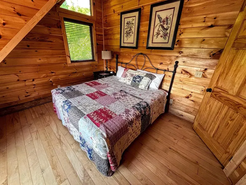 Second upstairs King room with full bath outside door.