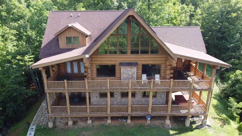 View of the cabin and the new landscaping and firepit (the grass has now taken hold).